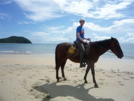Taking the horse for a little wander along the beach